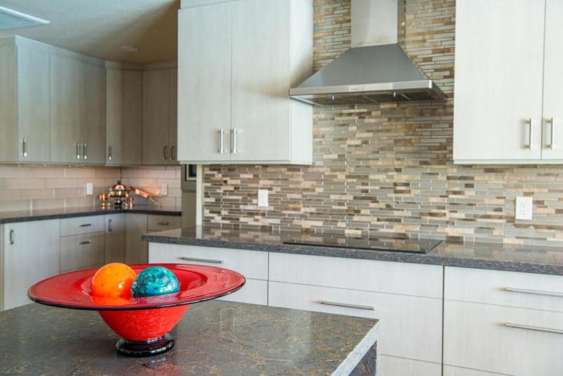 Kitchen with new backsplash tile and countertops