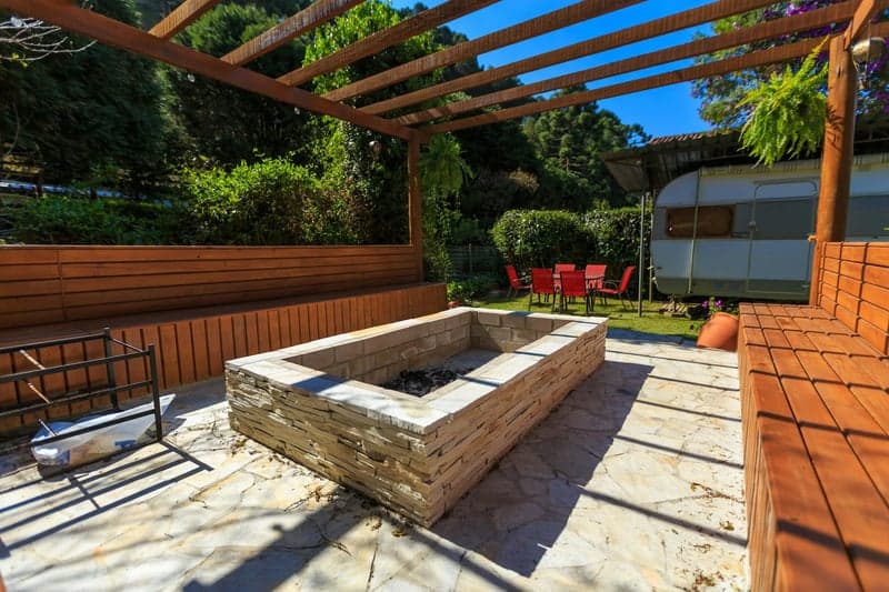 Wood deck with outdoor furniture and pergola
